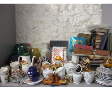 A large miscellaneous lot to include vintage ceramics and glassware, retro coloured glass, books and records, ephemera and tr