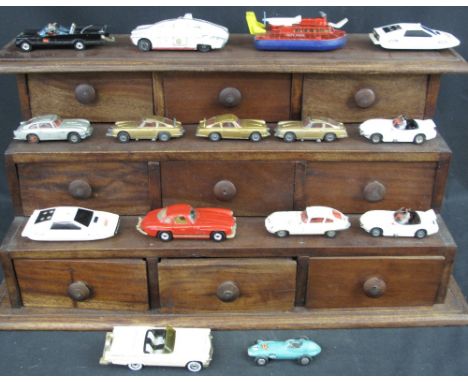 A collection of vintage play worn Corgi and Dinky diecast vehicles to include; Corgi James Bond Aston Martin DB5 x3, James Ne