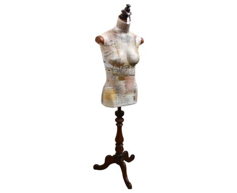 Clive Fredriksson, a decoupage decorated half-size mannequin of the female form, on pine tripod stand, height 146cm 