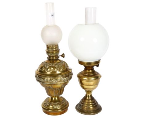 Victorian embossed brass oil lamp with chimney, 51cm, and a Duplex brass oil lamp with shade and chimney 