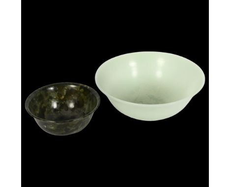 A jade bowl and a spinach jade bowl, on foot, 12.5cm across 