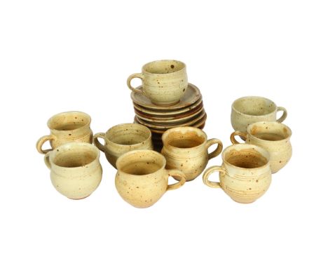 Ray Finch for Winchcombe Pottery, a set of 9 stoneware cups and saucers, pottery and makers mark to some pieces, cup height 7