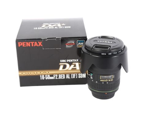 A Pentax 16-50mm F2.ATD camera lens (works in auto focus but not manual focus), boxed 