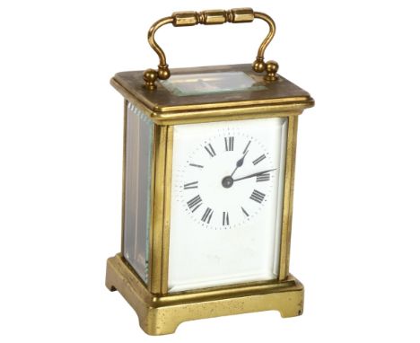 A French brass-cased carriage clock, white enamel dial with Roman numeral hour markers, case height 11cm, not currently worki