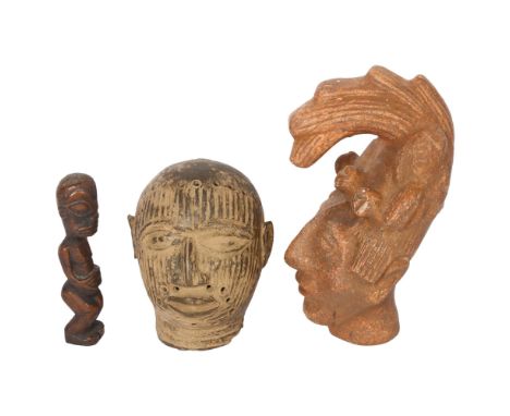King Pakal Mayan terracotta head, a patinated pierced brass head, height 14.5cm, and a small fertility figure 