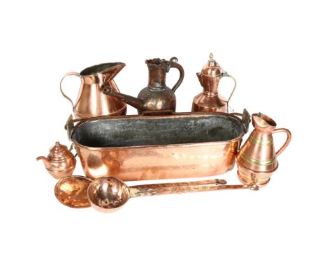 A Vintage French copper fish kettle, length 48cm, 2 copper utensils, a ladle and a spoon, and 5 Vintage French copper jugs of