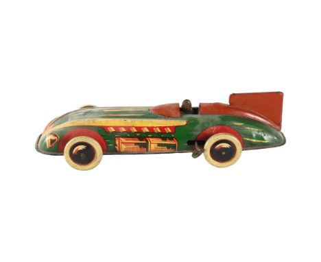 A vintage Wells Brimtoy tinplate clockwork racing car, length 29cm. 