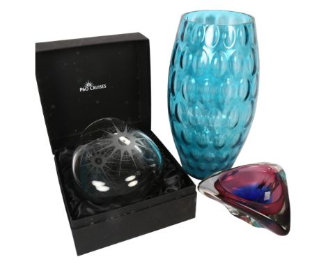 A large blue glass vase, 36cm, a Dartington Crystal 2011 vase commemorating the Artemis Grand Voyage with compass design, and