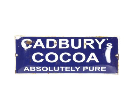 A blue and white monochrome enamel sign, Cadbury's Cocoa Absolute Pure, length 40cm 