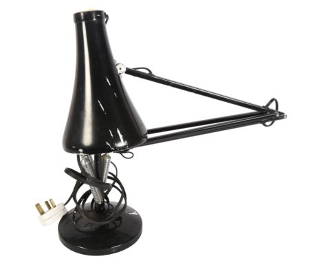 HERBERT TERRY - a mid-century black anglepoise lamp on circular base, stamped to the bottom of the stand 