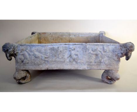 A lead planter in the neoclassical taste, square with ram's head cast corners, side decorated with putti on monopodia feet, l