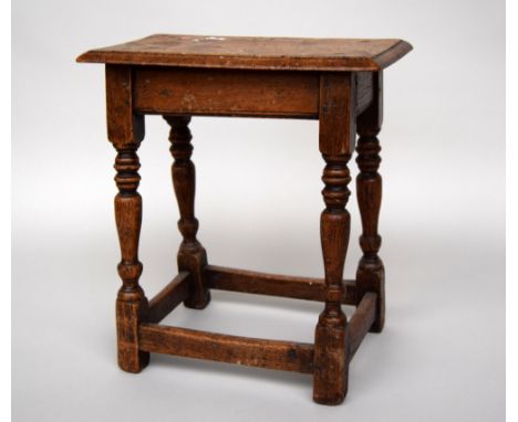 An oak joynt stool of customary form on turned legs 47cmW x 50cmH