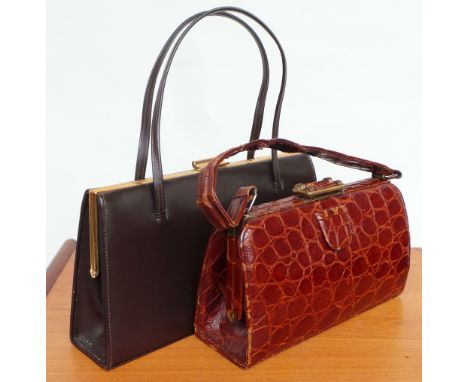 Two vintage handbags. A 'Russell & Bromley' reptile skin bag with a brass clasp and fittings, suede lined and zipper compartm