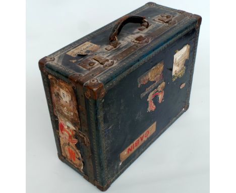 Lovely wood and tin clad 'Antler'  trunk with lots of labels and good vintage condition throughout. 22"L x 16"W x 9"DProvenan