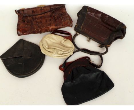 Five vintage handbags to include three leather 20's/30s bags, two with lucite handles, a leather and skin bag - worn, and an 