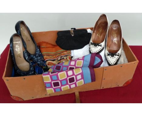 A mixed lot of vintage blouses and scarves and two pairs of 1960s shoes all in a 'Bridport and District Laundry' box. (Qty)