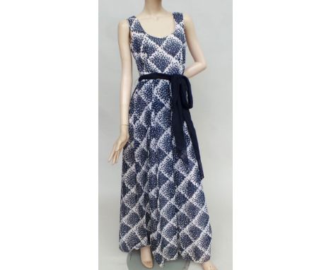 Four 1960s/70s maxi dresses. A Richard Shops navy and white lined dress with sash size 10, a Hildebrand floral pattern lined 