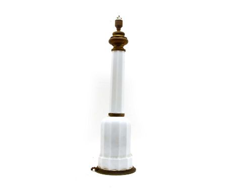 A French opaque glass table lamp, of faceted form, 60cm high, together with a castellated copper jelly mould, 15cm diameter, 