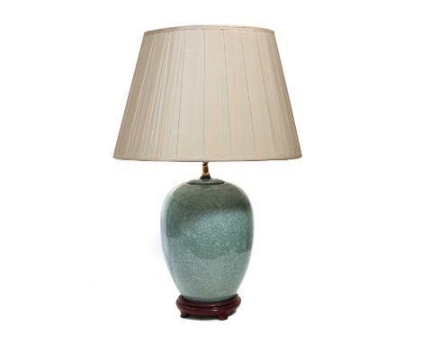A Chinese crackle glazed celadon table lamp, contemporary, and a blue and white example (2)Condition report: General light we