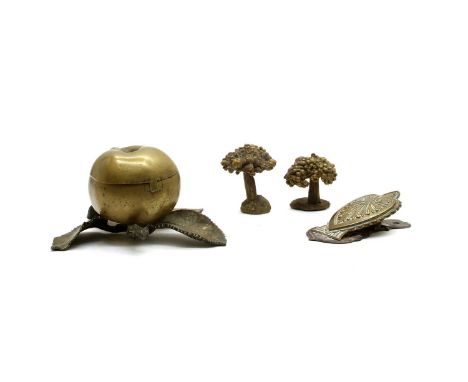 A Victorian bronze inkwell, in the form of an apple and snail, on a base with four leaves, 9cm high, a Victorian pressed meta