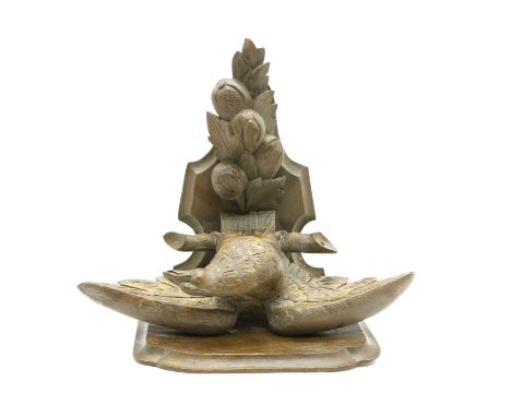 A carved wood wall bracket, decorated with an Eagle, 44cm wide x 37cm highCondition report: A loose joint accross the wings.