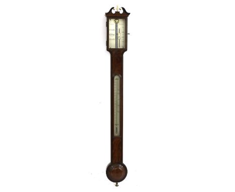 A George III mahogany stick barometer, by Dollond of London, with an ebonised broken swan neck pediment above the silvered re