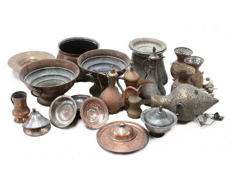 A large quantity of Eastern metalware, to include a hanging lantern set with glass cabochons, four coffee pots, two large foo