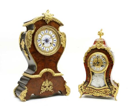 A French walnut and ormolu mounted mantle clock, by Marshall et Fils, Paris, late 19th century, of bombe form and on scrollin