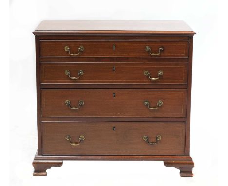 A mahogany, satinwood crossbanded and inlaid batchelor's chest, with a leather lined brushing slide above four graduated cock