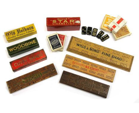 A collection of cigarette advertising cribbage boards, playing cards, domino sets, etc. The Trevor Barton Collection