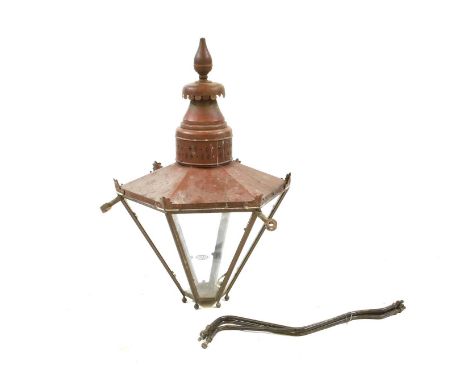 An hexagonal copper lantern, now wired for electricity and iron brackets, a large porch lantern, now convected to electricity