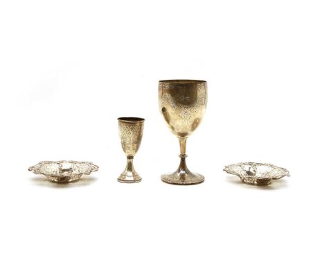 A Victorian silver goblet, maker AM, London, 1868, with floral swag decoration, together with a Kiddush cup, decorated with s