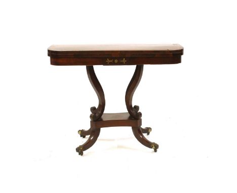 A rosewood brass inlaid Regency card table, on splay base, 91.5cm wide, 45.5cm deep, 71.5cm highCondition report: losses to v