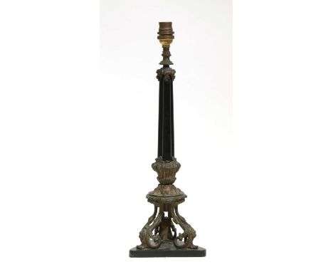 A gilt metal mounted cluster column table lamp, late 19th/early 20th century, with scrolling acanthus detail, on a triangular