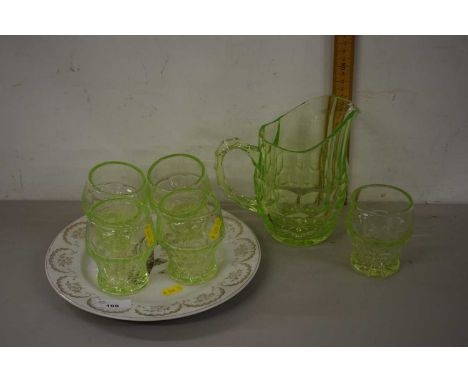 Glass wares including large green glass jug and quantity of tumblers and a ceramic plate with a fish design
