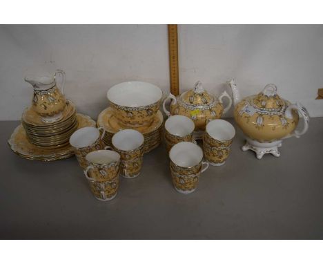 A 19th Century English porcelain tea set circa 1860 comprising teapot, sucrier, milk jug and six cups and saucers with side p