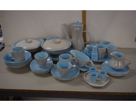 Quantity of Poole Pottery dinner wares including dinner plates, two tureens and covers, coffee pot, mugs and cups etc