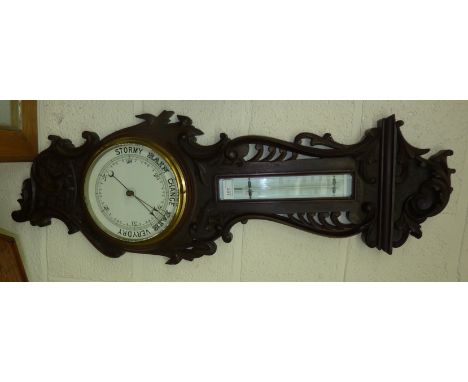 Wall barometer with carved mounts