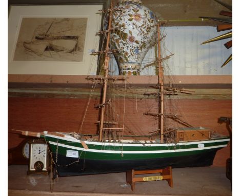 Wooden scale model of The Hooker fishing boat