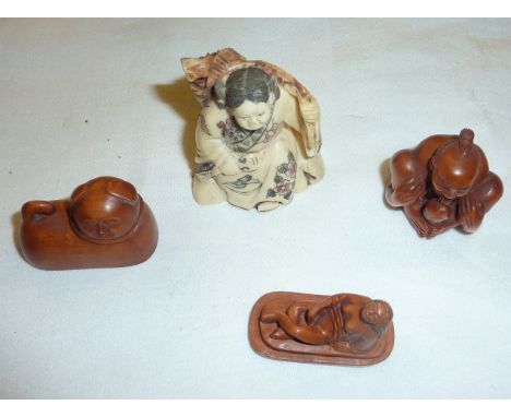 2 carved wood and a carved bone netsuke