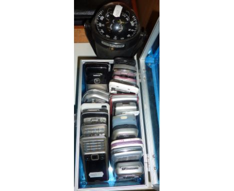 Selection of mobile phones, compass etc