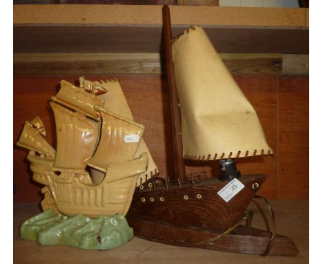 1970's retro boat lamp and a cast metal boat doorstop
