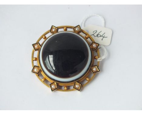 19THC VERY LARGE CIRCULAR GOLD MOUNTED   brooch with a big banded agate stone and pearl set  border 47g inc        