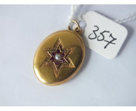 Gold, ruby &amp; pearl locket with glass  panel to back        