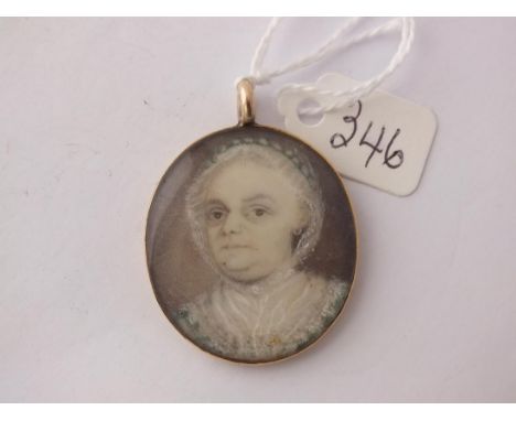Geargian gold mounted oval miniature   portrait pendant of a lady      