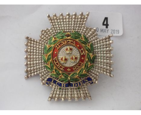 A silver and enamel large badge     
