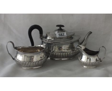 Victorian bachelor half reeded three piece tea service, 8"  over spout Lon 1891 by EH 595g.     