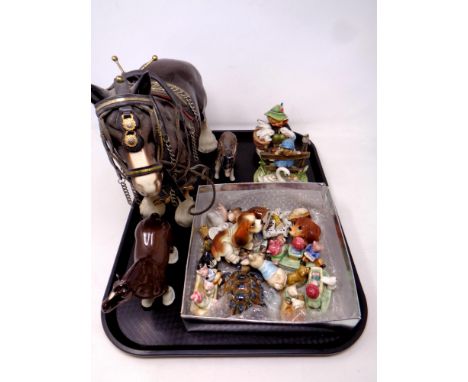 A tray containing assorted ceramic ornaments to include shire horses, two West German Hummel figures, a Lladro figure of a bo