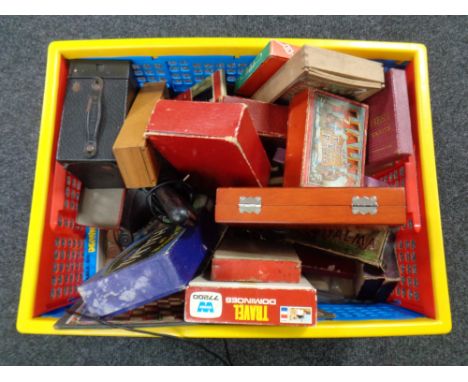A crate of vintage games, dominoes, boxed Brownie camera etc 