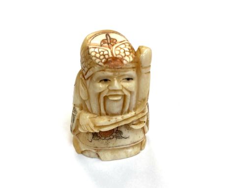 A Japanese carved bone netsuke - Village elder with long beard. 